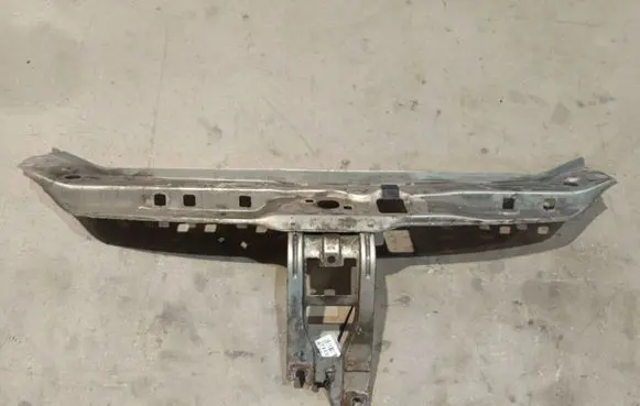 Radiator support slam panel