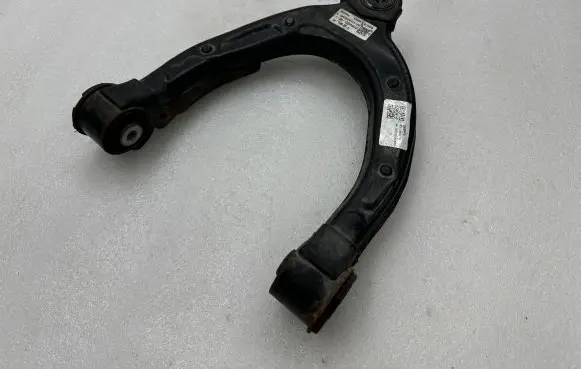 Tesla Model Y Front upper control arm/wishbone 104432100J J21226D06294