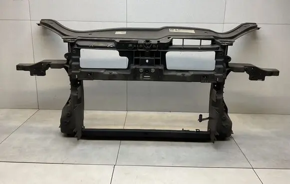 Radiator support slam panel