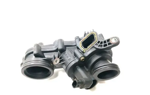 Thermostat/thermostat housing