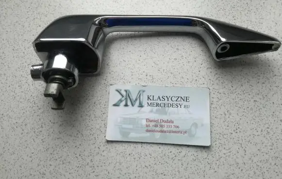 Mercedes-Benz COMPAKT W115 Front door exterior handle/bracket 1157660101