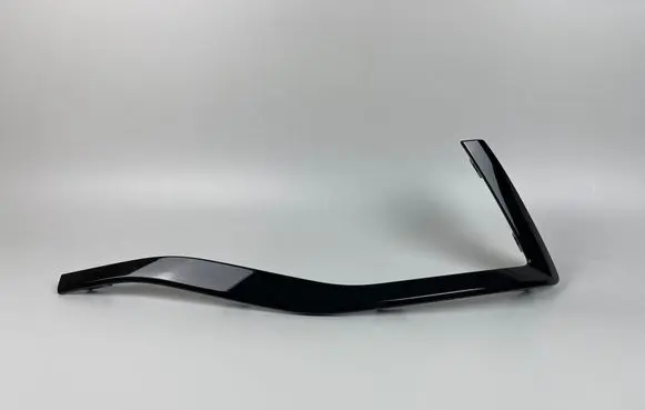 Rear bumper trim bar molding