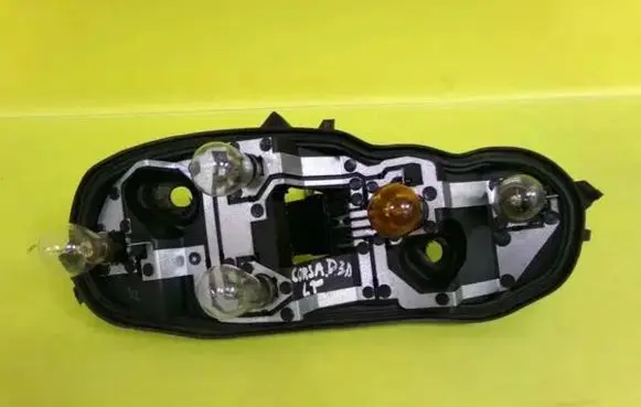 Opel Corsa D Tail light bulb cover holder 89037853