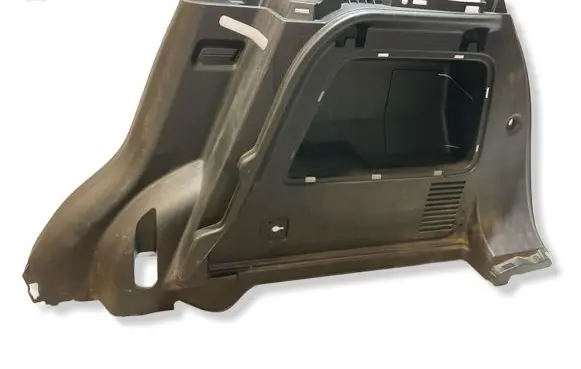 Trunk/boot lower side trim panel