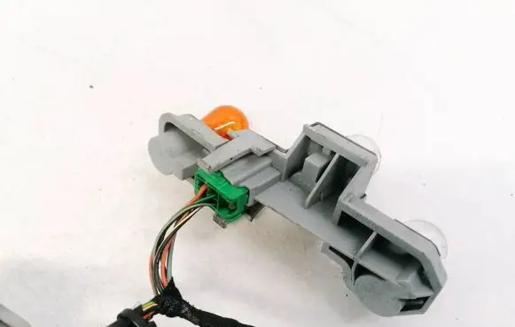 Volvo C30 Tail light bulb cover holder