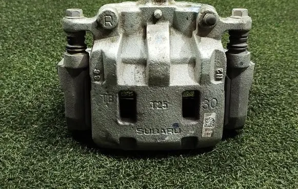 Subaru Outback (BT) Front brake caliper 0F00X T25