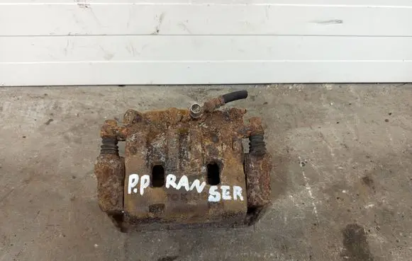 Ford Ranger Front brake caliper ZACISKPRPRANGIV