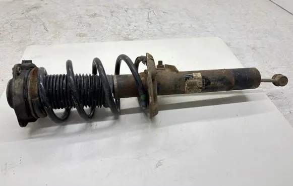 Volkswagen Touran I Front shock absorber with coil spring
