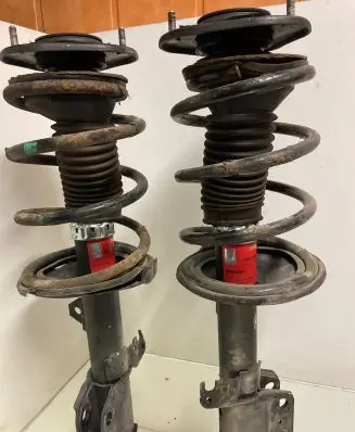 Toyota Corolla Verso E121 Front shock absorber with coil spring JGM1035SL
