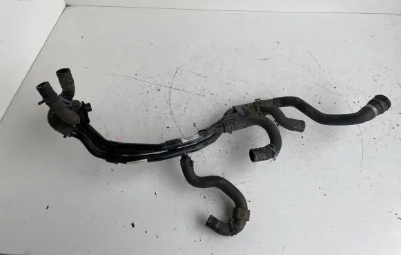 Volkswagen Golf VII Engine coolant pipe/hose 5Q0121064BM