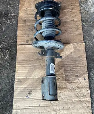 Front shock absorber with coil spring