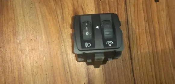 Headlight level height control switch