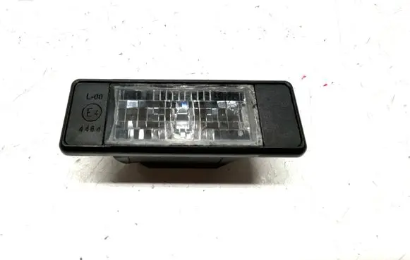 Nissan Juke I F15 Number plate light 25300100