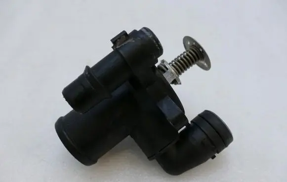 Thermostat/thermostat housing
