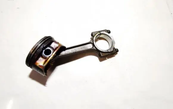 Piston with connecting rod