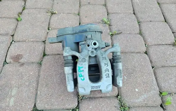 Opel Corsa F Rear brake caliper 9837166080