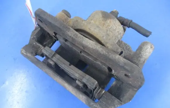 Mazda 323 Front brake caliper