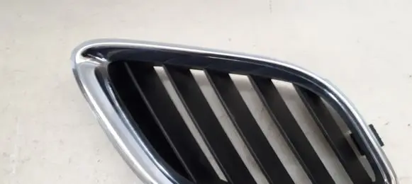 Saab 9-5 Front bumper upper radiator grill 5142831 5142831LH