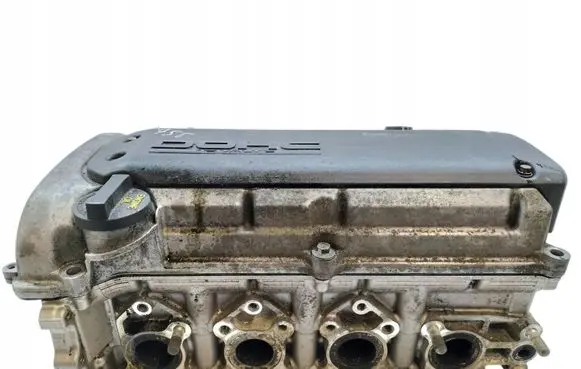 Suzuki Swift I Engine head 