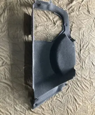 Trunk/boot lower side trim panel