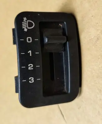 Headlight level height control switch