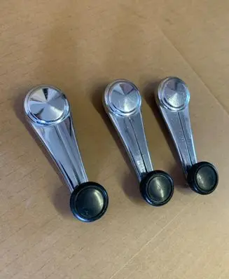 Opel Kadett B Front door window winding handle 6959158