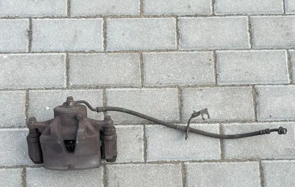 Hyundai Tucson TL Front brake caliper