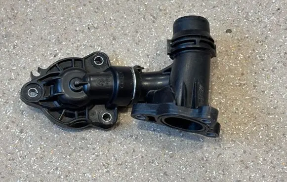 Thermostat/thermostat housing