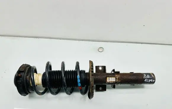Volkswagen Cross Polo Front shock absorber with coil spring