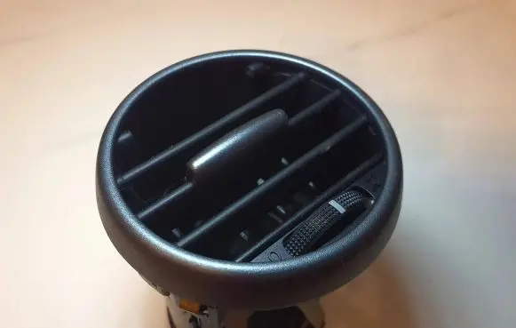 Dash center air vent grill