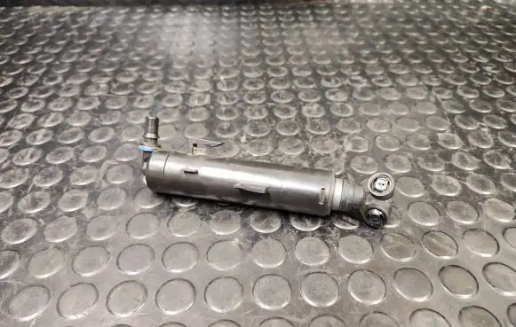 Headlight washer spray nozzle