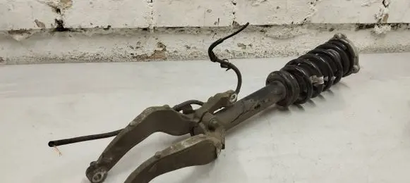 Front shock absorber with coil spring