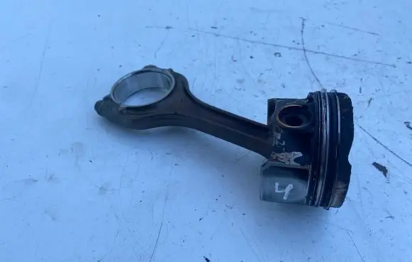Piston with connecting rod
