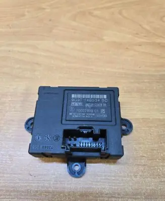 Volvo V70 Door control unit/module 9G9T14B534BC 1002299901