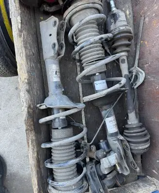 Toyota Yaris Verso Front shock absorber with coil spring 6456344