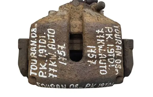Volkswagen Touran I Front brake caliper 