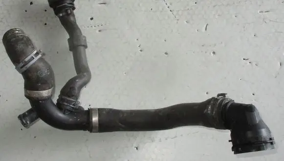 Skoda Superb B6 (3T) Engine coolant pipe/hose 1k0122101KP