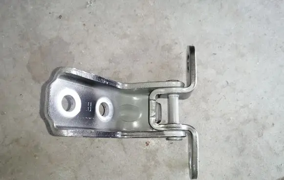 Front door lower hinge