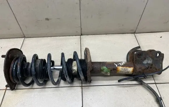 Mitsubishi Colt Front shock absorber with coil spring