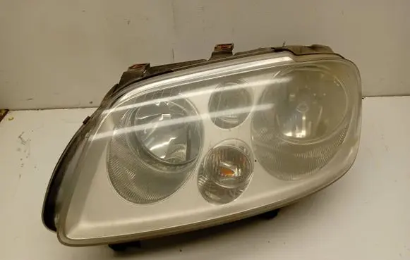 Volkswagen Touran I Headlight/headlamp 0301205201 1T0941005D