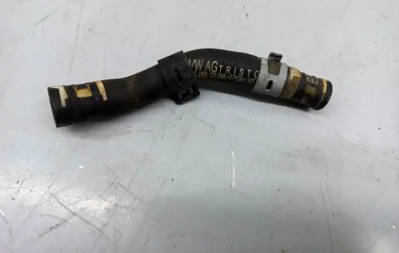 Volkswagen Jetta VI Engine coolant pipe/hose 06K121049