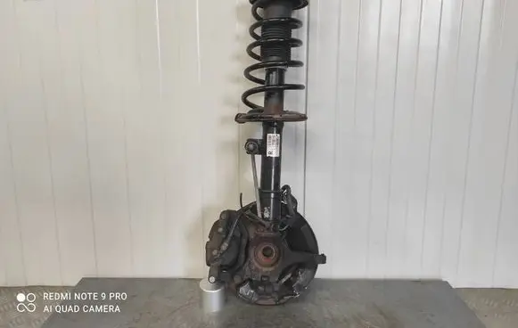 Suzuki Swift I Front shock absorber with coil spring 4160162J32 TWOJEAUTOWYSZKOW