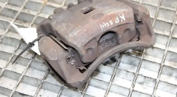 Nissan Juke I F15 Front brake caliper
