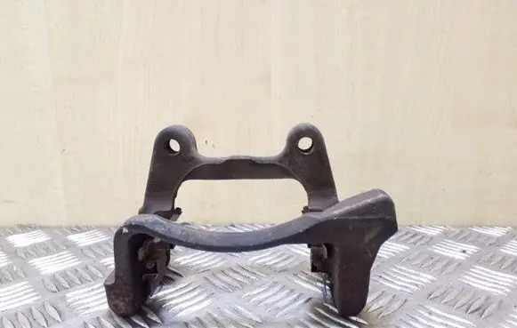 Volkswagen PASSAT B7 Brake caliper pad carrier rear 