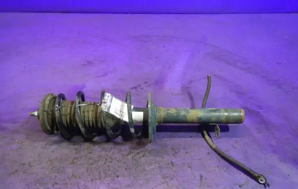 Front shock absorber with coil spring