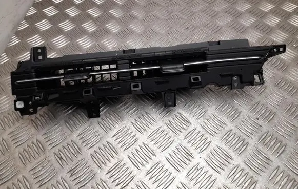 Dash center air vent grill
