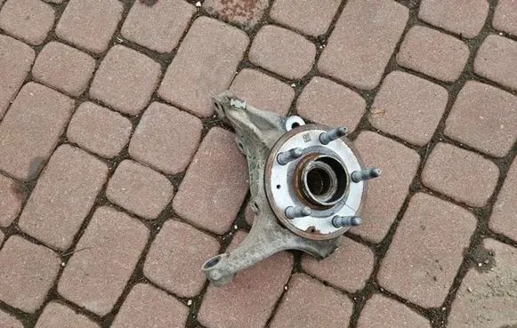 Opel Insignia B Front wheel hub spindle knuckle 23384198