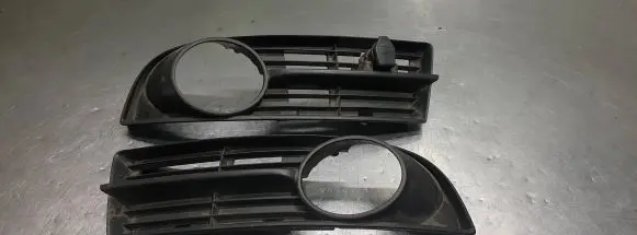 Volkswagen Touran I Front bumper lower grill 1T0853665A