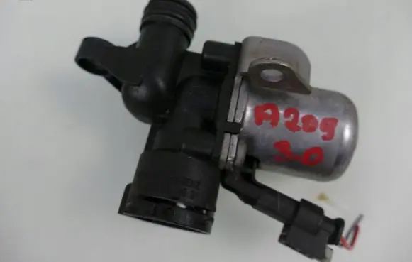 Coolant heater control valve