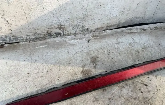 Mitsubishi Lancer Trunk door license plate light bar 